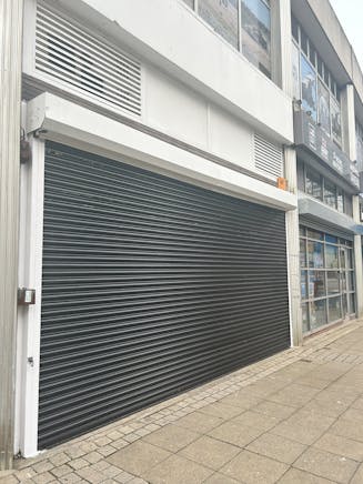 Unit 20 Hereward, Midgate, Peterborough, Retail To Let - Roller shutter .jpeg