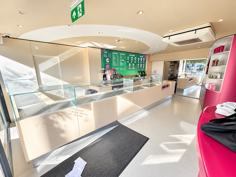 190 Camden High Street - Sunlit Modern Juice Bar Interior.png