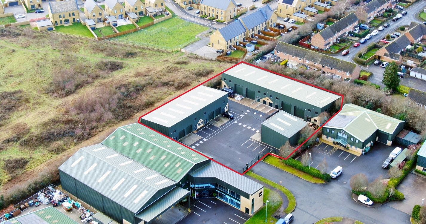 Four Shires Court comprises a development of quality modern Industrial and Warehousing units situated on a self-contained secure and gated site of 0.358 hectares (0.885 acres).

The units are all constructed to a modern specification built around steel portal frames incorporating concrete floors with clad and insulated elevations and stone features all under a mono pitched clad and lined roof incorporating translucent panels.

Each unit has a height to eaves of between 6.5-6.75m and is provided with concreate loading aprons and electrically operated roller shutter doors. Racking shown in the photographs is not included but might be available by negotiation with the outgoing tenant.

The units are available either as individual units or combined, on new fully repairing and insuring leases, all exclusive of other outgoings and subject to contract.