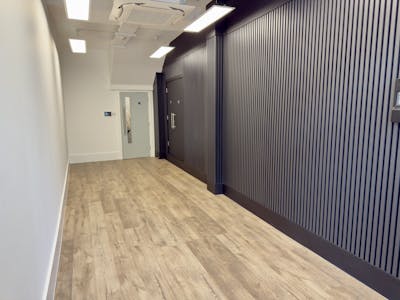 188 Tooley Street, Southwark, SE1, London, Leisure / Office / Retail To Let - 118 Tooley Street  Modern Hallway With Wooden Floor And Black Wall Panels.jpg