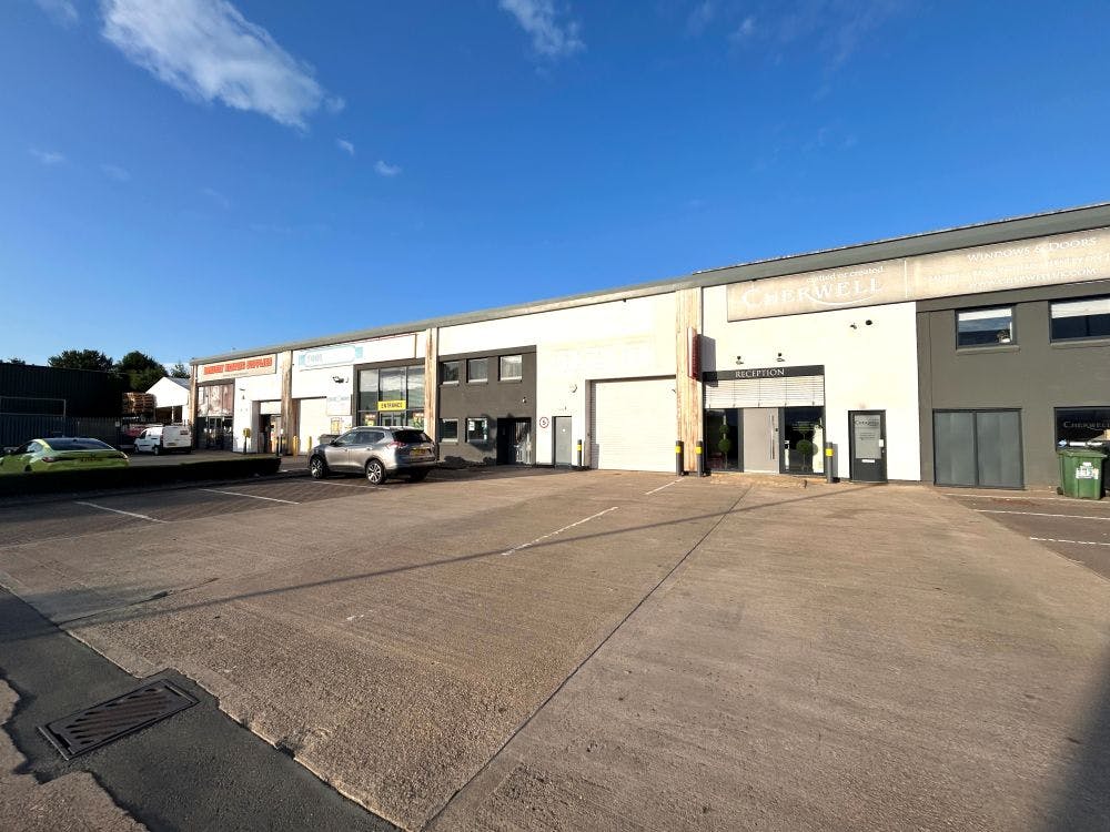 The mid-terrace trade counter unit benefits from a partially-glazed frontage with open plan trading area, level-loading entry door and good loading, together with parking. The unit has a generous eaves height of 6.9 meters.