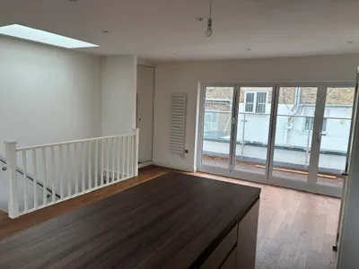 148 Kentish Town Road, London, Investment For Sale - Reception Room doors to balcony.jpg