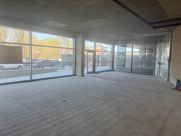 Ground floor retail unit - Armstrong House, Fletton Quays East, Peterborough, Retail To Let - Frontage.jpeg