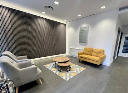 30-31 Furnival Street, London, Office To Let - 3031 Furnival  Modern Lobby With Seating And Decorative Wall Paneling.jpg