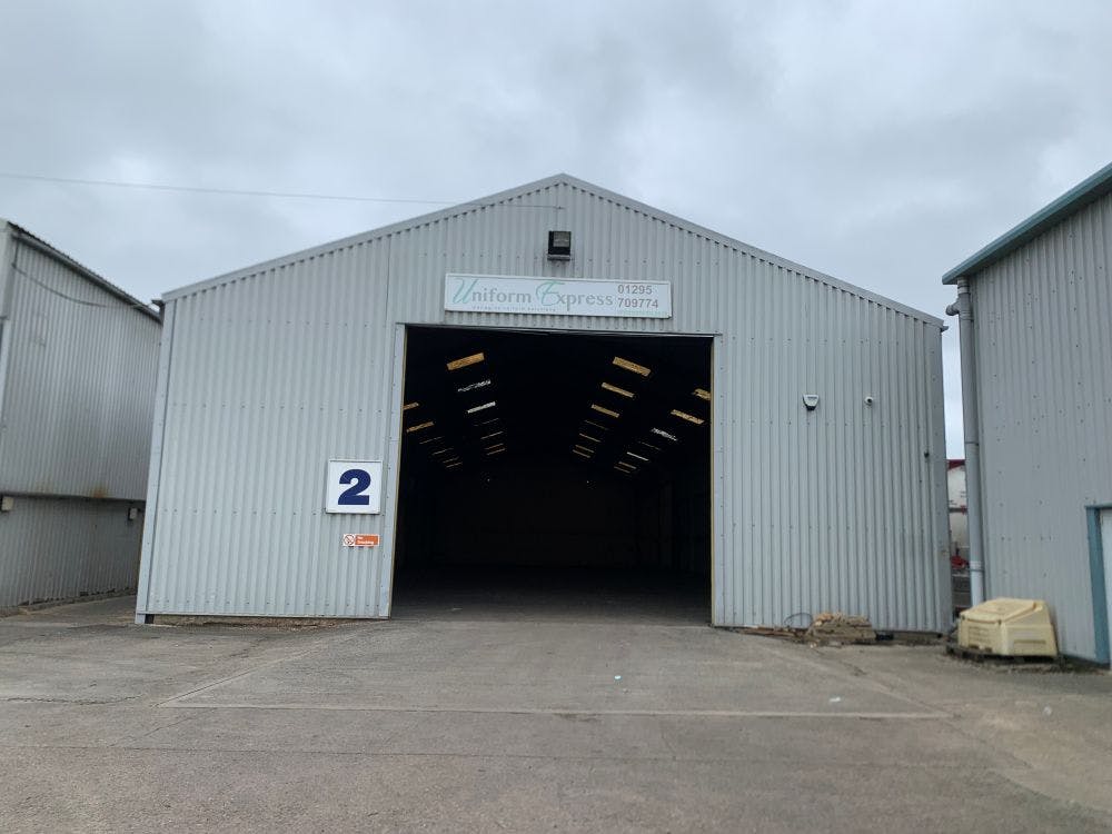 Unit 2 is an industrial/workshop unit, with a roller shutter access door to the front elevation. The property has concrete floors, with composite panelling to eaves, under a pitched profile sheet roof with rooflights. The unit will be available refurbished.

The unit features the following:
• Roller shutter door to the front elevation
• Height to eaves is 6.2m
• Hardstanding concrete apron storage/parking area to front elevation
• 3-phase electricity