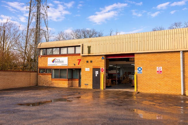 7 Harold Close, Harlow, Industrial To Let - Rainbow Carpets & Flooring warehouse at sunset.jpg
