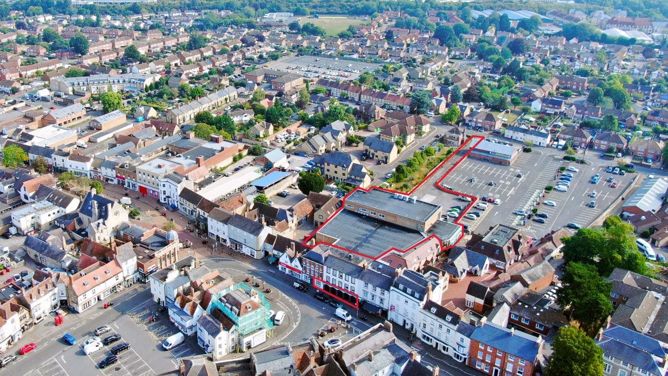3 Market Square comprises retail accommodation in a prominent Grade II Listed  three storey period building fronting Market Square. The property benefits from a large modern rear extension over two floors providing retail sales at ground floor level and ancillary storage at both ground and first floor.

The rear extension also benefits from a secondary entrance, which links to the Claremont Car Park, one of Bicester’s main car parking facilities, situated to the rear. The property has its own separate access road, service area and loading bay accessed off Victoria Road, with a roller shutter door for store deliveries.

To the rear are 38 car parking spaces currently let to Cherwell District Council and form part of a wider Victoria Road council run car park which provides a total of 159 additional surface car parking spaces.