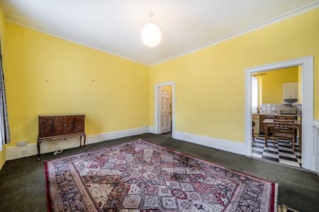 255 Gray's Inn Road, WC1X, London, Office / Residential To Let - 255 Grays Inn Road  Bright Yellow Room With An Ornate Rug.jpg