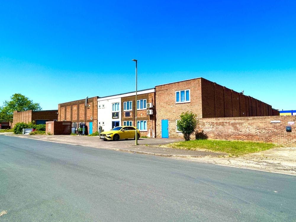 The wider property comprises warehouse and production areas (yellow/red areas as per plan – now fully let) at either end of the site, with quality office accommodation including WC’s, storage areas and kitchen/break out space (cyan on plan). There is also a central secure and gated yard which provides access for loading and unloading. 

The offices are mainly open plan and comprise linoleum/carpeted floor coverings on concrete, with plaster painted walls, suspended ceilings incorporating LED lighting, together with comfort cooling and with a number of private perimeter offices.