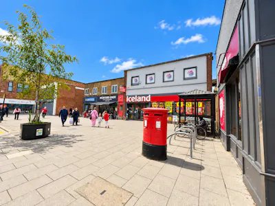 45-47 High Street, Wickford, Retail To Let - Sunny British Shopping Precinct with Iceland and Postbox.png