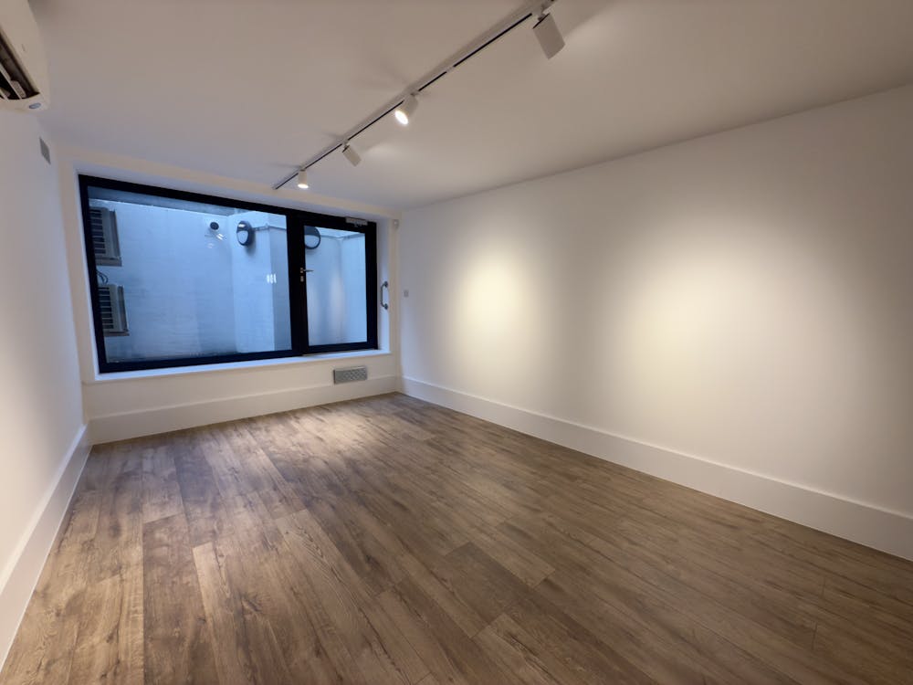 188 Tooley Street, Southwark, SE1 - 118 Tooley Street  Minimalist Room With Wood Flooring And Large Window.jpg
