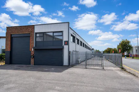 Guinness Estate, Guinness Road, Trafford Park, Industrial / Trade Counter / Urban Logistics To Let - 2 Guinness external closed shutters.png