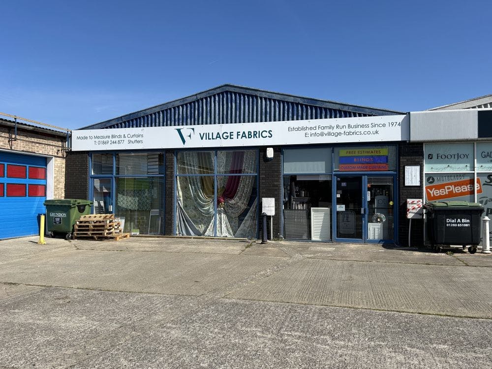 The property comprises a prominent modern terraced retail showroom property with lease assignment available until 1st Jan 2032. The property has modern glazed frontage with a shared car park to the front.  Local operators include Howdens and Travis Perkins.