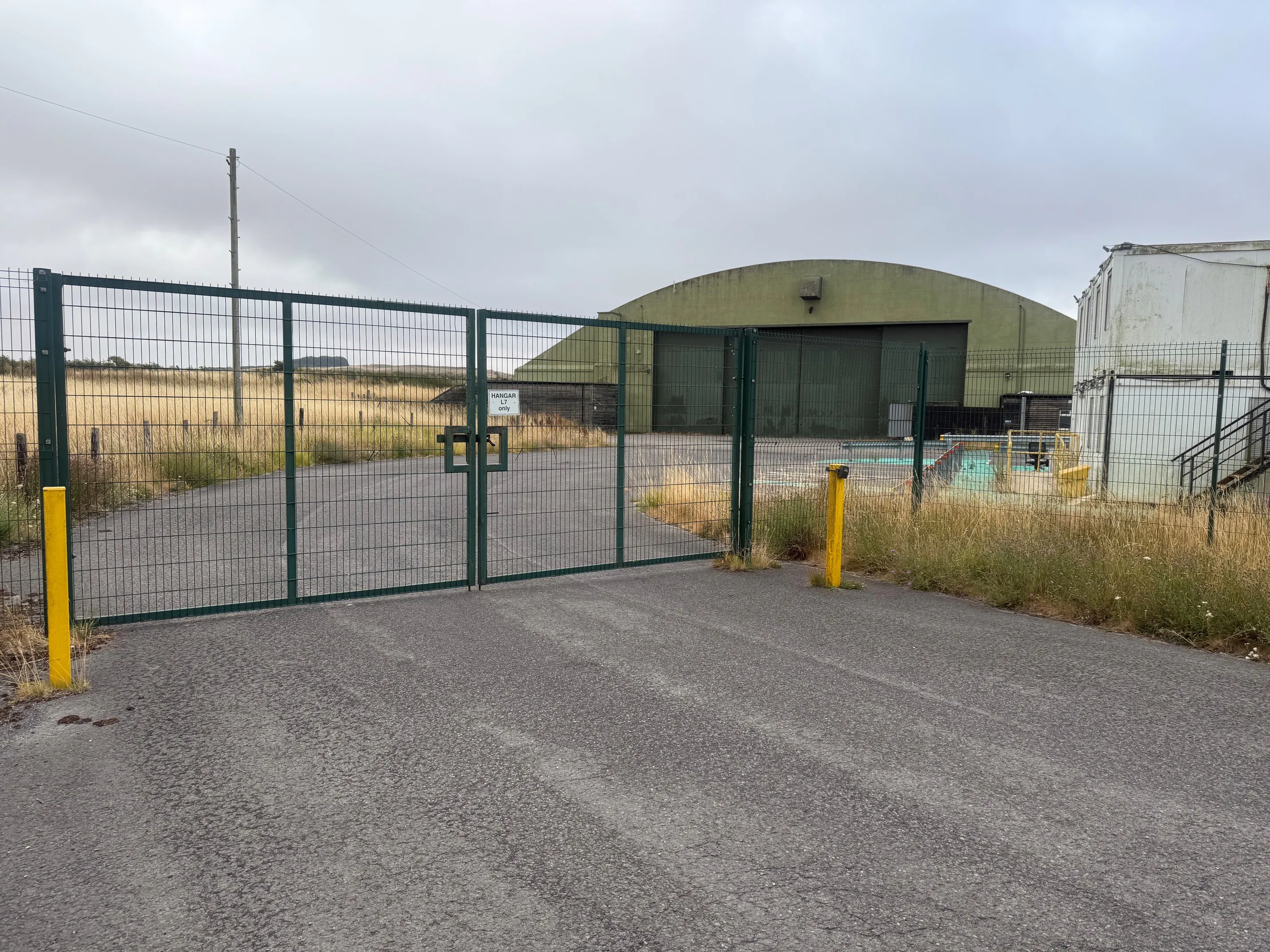 Office Building, Hangar L7, Wroughton Airfield, Swindon, Industrial / Land & Development  / Office To Let - Exterior 8 gated entrance.jpg