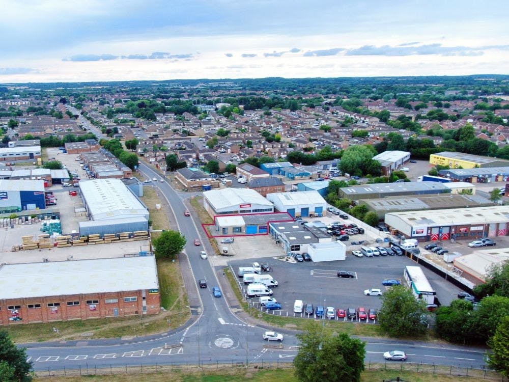 The property comprises a prominent modern end of terrace retail showroom property with first floor mezzanine. The property has modern glazed frontage with a shared car park to the front, eaves to 3.5m and up and over sectional door measuring 2.57 x 3.6m. Local operators include Howdens and Travis Perkins.
