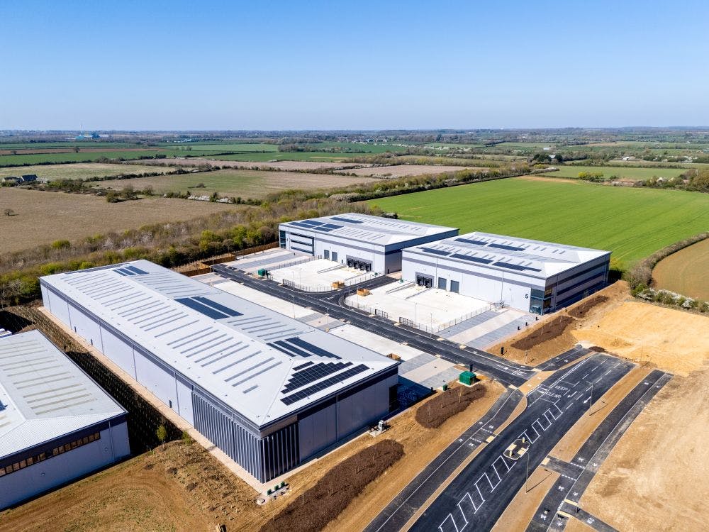 Axis J9 currently provides 500,000 sq ft of new commercial buildings set within a prime business park  environment just 3 miles from J9 M40 and 1 mile from Bicester Village with close to 10,000+ planned new homes.

Phase 4 comprises the continuation of this highly successful development. The units are being built speculatively  to satisfy the demands of industrial and logistic operators.  Choose between two high specification buildings ranging from 41,506 – 92,678 sq ft (by combining the units) which are designed for distribution and production uses. Each building has dedicated car parking, large service yards and excellent loading facilities.  Planning  permission is for B1, B2 and B8 uses without hours of use restrictions.