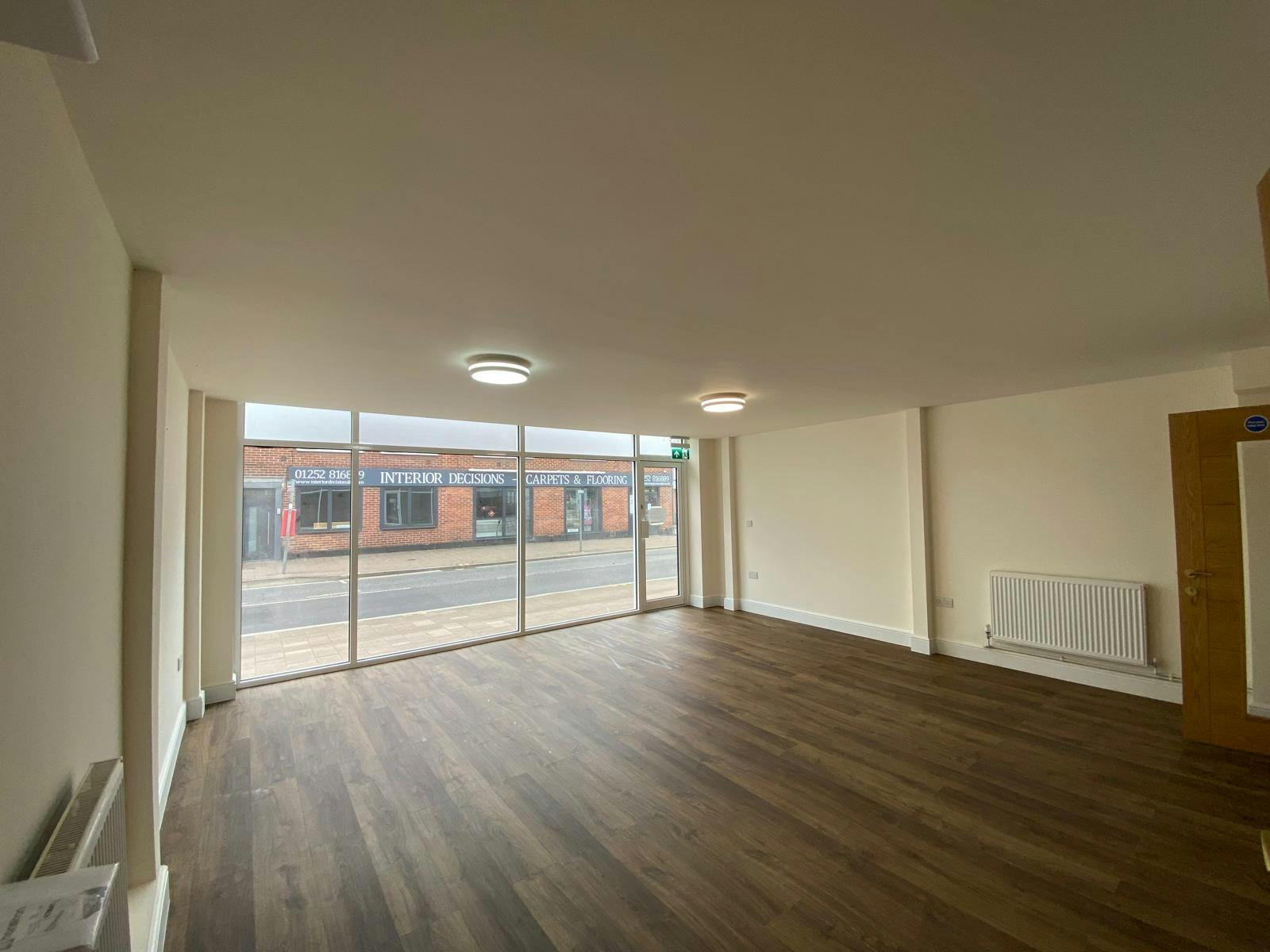 102 Fleet Road, Fleet, Retail To Let - Shopfloor facing front 2.JPG