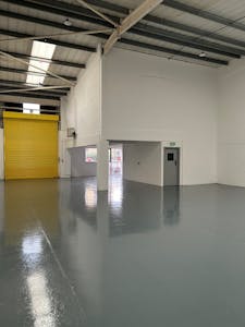 Units 9 &  18, Watermill Business Centre, Edison Road, Enfield, Industrial To Let - Warehouse with roller shutter.jpg