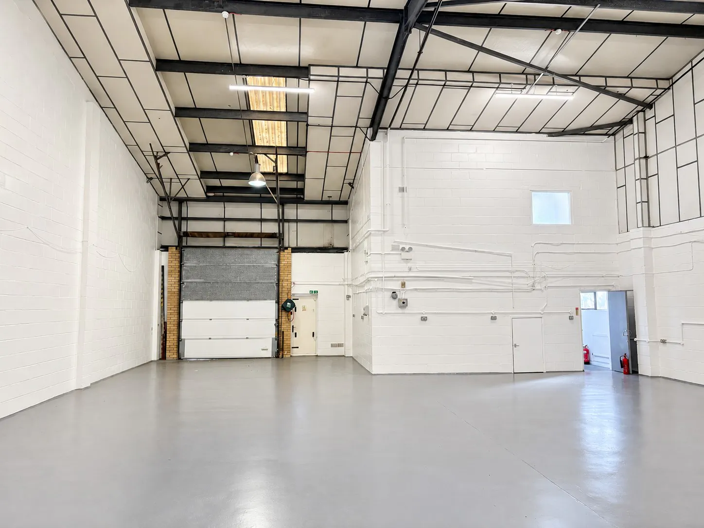 7 Harold Close, Harlow, Industrial To Let - Warehouse and shutter.jpg