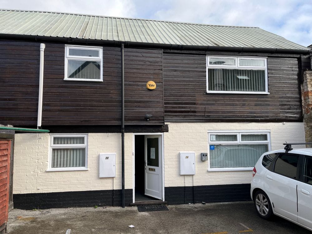 The property is situated to the rear of 2 North Street and was formerly occupied by a dentist practice. The premises is arranged over 2 storeys, providing ground floor retailing/storage, with a separate studio/office, reception, kitchen and WC.

The first floor comprises two offices/studios and separate WC. The premises are heated via electric storage heaters. There are no allocated parking spaces.