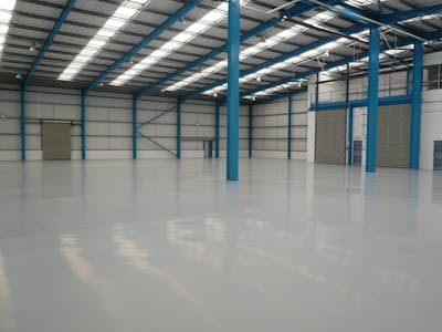 Unit 5 Thorpe Industrial Estate, Alpha Way, Egham, Industrial/Logistics / Industrial / Warehouse Lease Assignment - Unit 5, Alpha Way, Egham, internal warehouse historical roller shutters.JPG