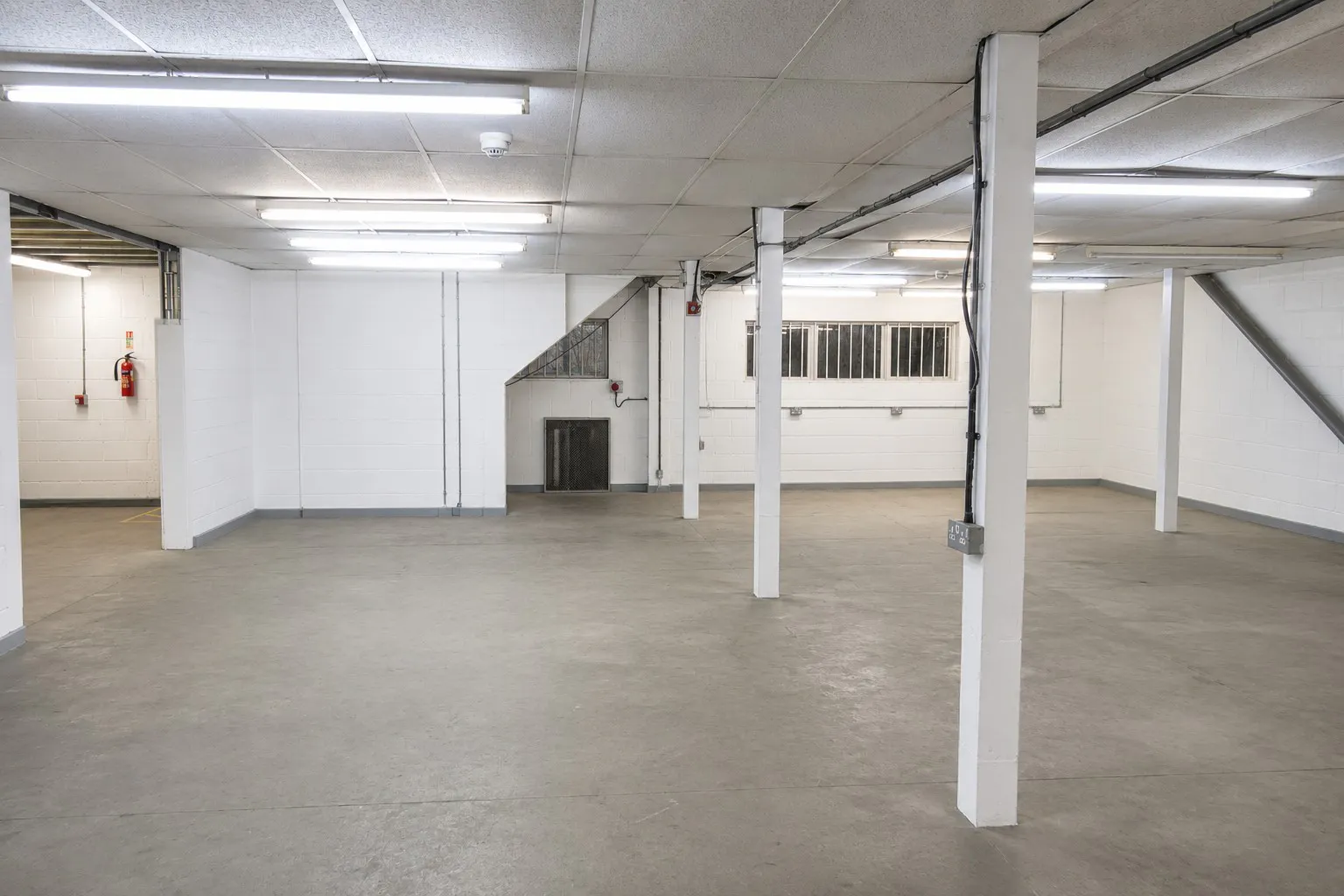 4 Oak Industrial Park, Great Dunmow, Industrial To Let / For Sale - Warehouse Number 3 under mezzanine.jpg