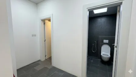 Prime Commercial Space for Rent / Sale in Golf Tower, Madinat Al Irfan, Investment / Office / Retail To Let - Golf Tower toilet front area.png