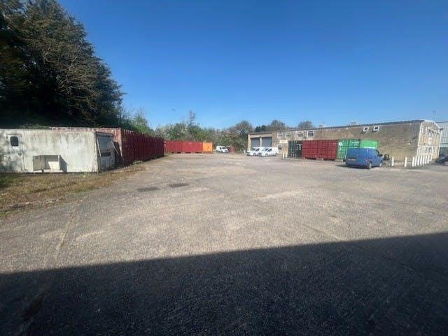 Unit 19, Corsham, Industrial For Sale - Yard with containers and building.jpeg