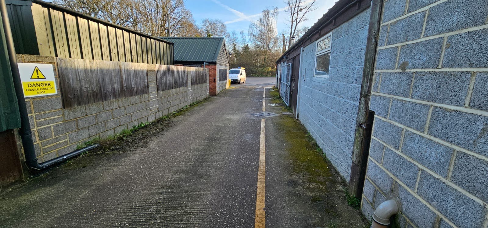 Bullhousen Farm, Shaftesbury Road, Woking, Investments / Industrial / Warehouse For Sale - LOOKING TOWARDS ENTRANCE TO SITE.  UNITS 1 1212A ON RIGHT.JPG