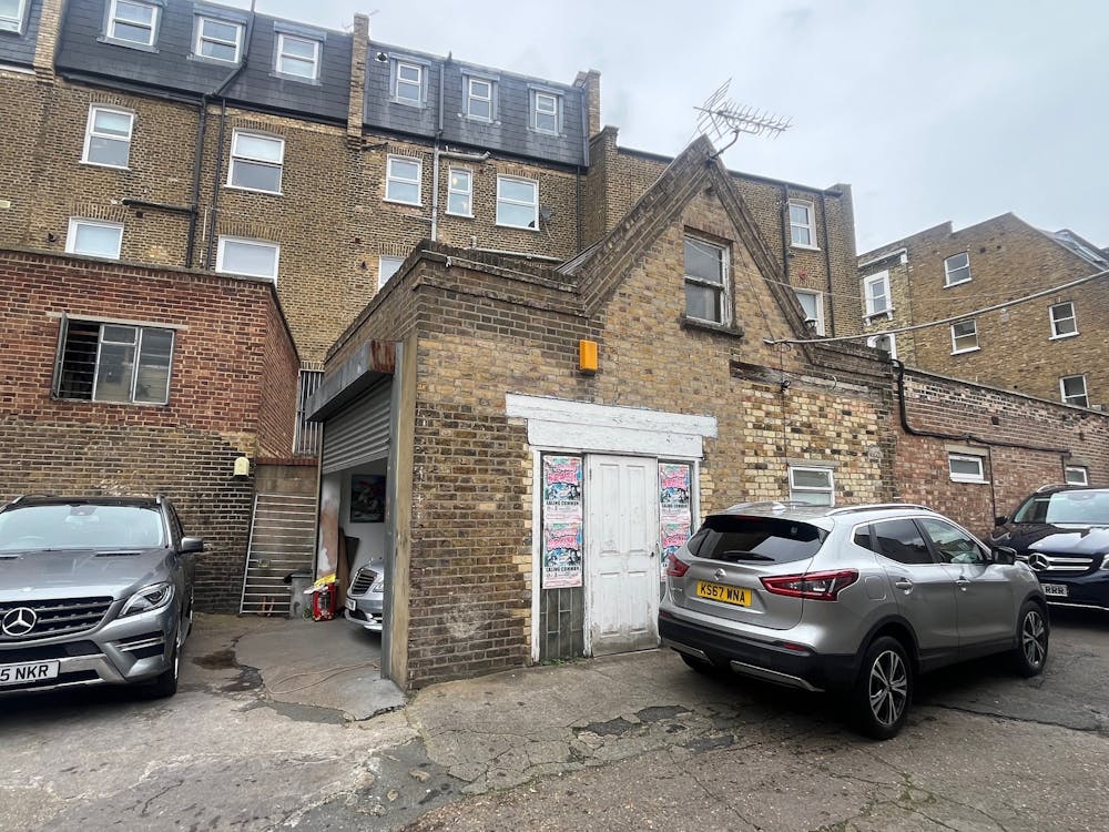 124b St. Stephens Avenue - Pitched outbuilding - valet area.jpg